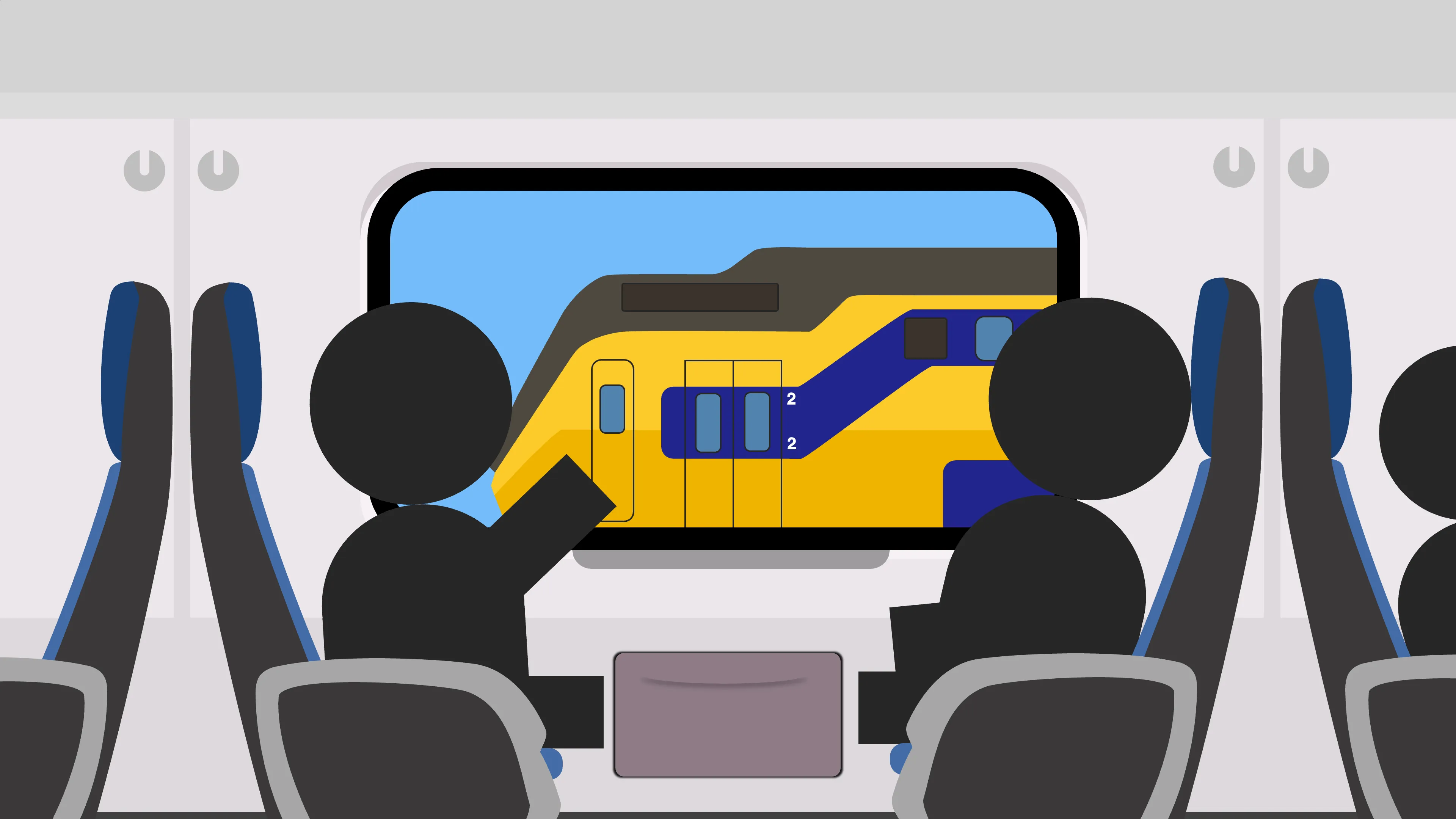 Two people share a table in a Dutch VIRM train